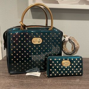 Emerald green handbag with matching wallet.